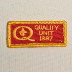 1980s Quality Unit 1987 Red Embroidered Sew On Patch Yellow Applique