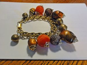Vintage 50s Beaded Coro Charm Bracelet Autumn Tone Brown Orange Plastic Sugar Beads Goldtone Chain - Fashionconservatory.com