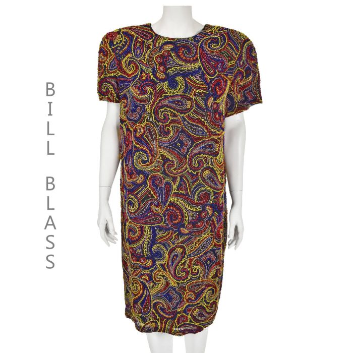 glass beads dress Scallop shell inspired dress consisting of a bustier embroidered with  crystals and glass beads, a skirt in hanging beaded fringes