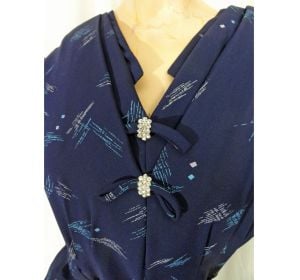 Vintage 1950s Dress Navy Blue Art Deco Print Sheer with Rhinestones Fancy Neckline Original Belt - Fashionconservatory.com