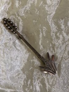Silver plant form pin