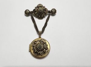 Victorian Revival brooch with dangling locket 