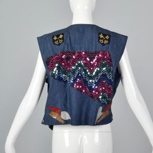 XL 1990s Vest Blue Denim Jean Vest with Studs Patched Sequins and Ribbons Applique - Fashionconservatory.com