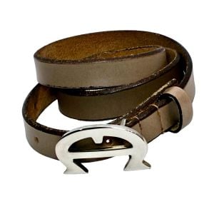 80s 90s Taupe Leather Belt with Sculptural Silver Logo Buckle - Fashionconservatory.com