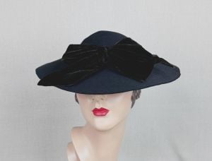 Vintage 40s Black Felt Wide Brim Tilt Hat with Velvet Bow and Back Placement Band by Baer-Kranich