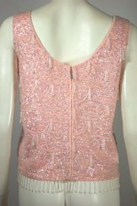 Pastel pink wool knit beaded fringe evening top 1960s sleeveless - Fashionconservatory.com