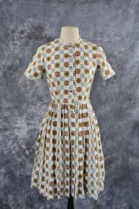 1950's Ivory Shirtwaist Dress with Embroidered Vertical Stripes  Ivory dress with vertical stripes s - Fashionconservatory.com