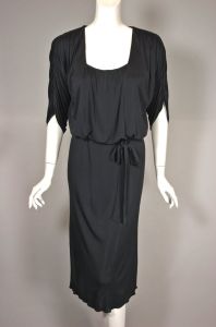 Becky Bisoulis 80s dress draped black jersey knit batwing sleeve