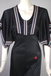 Black jersey 70s bellbottom jumpsuit rainbow trim | S-M - Fashionconservatory.com