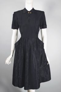 Bows novelty print black taffeta late 1940s dress flared skirt