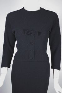 1950s sweater dress top and skirt set black knit wool with bow trim - Fashionconservatory.com