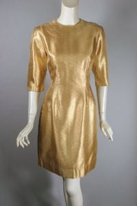Metallic gold early 1960s hourglass cocktail party dress