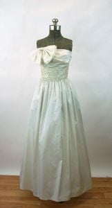 1980s gown wedding dress prom dress ivory 80s strapless dress bow on bodice pockets A J Bar - Fashionconservatory.com