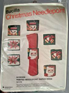 70s Bucilla Vintage Needlepoint Kit for 8 Christmas Napkin Rings w/Santa Bells Snowmen & Poinsettias
