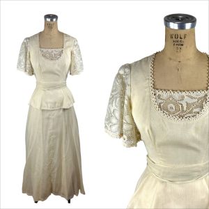 1970s ivory maxi prairie dress with lace flutter sleeves and peplum 