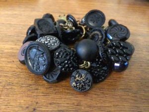 Charm Bracelet Made from Victorian Jet Carved Buttons - Fashionconservatory.com