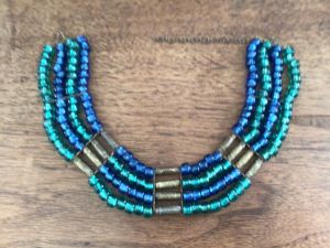 Beautiful blue and green foiled glass choker with brass fittings.. Adjustable 15'' to 18”