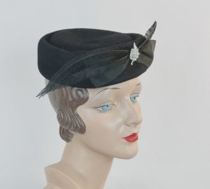 Vintage 60s Black Felt Pillbox Hat with Feather, Brooch and Bow - Fashionconservatory.com