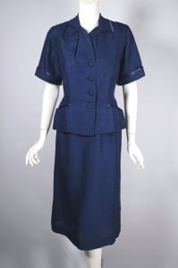 Lightweight navy blue rayon 1950s skirt suit with peplum S-M
