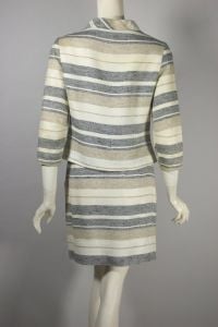 Neutral stripes 1960s mink skirt suit cream tan black bow neckline - Fashionconservatory.com