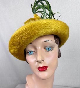 60s Mustard Color Faux Fur Derby Style Hat with Curled Brim and Green Feathers by Michael Terre - Fashionconservatory.com