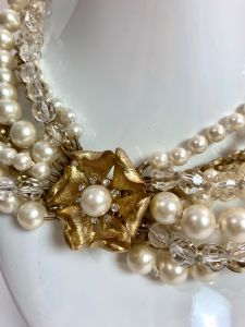 Multi Strand Pearl Statement Necklace with Large Floral Clasp - Fashionconservatory.com