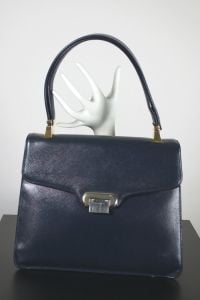 Textured blue leather handbag 1960s mod style adjustable strap