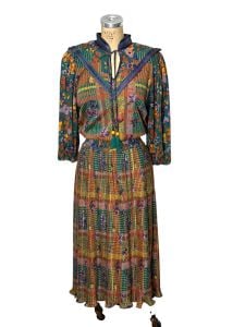 Diane Freis knit dress with floral geo print and pleated skirt Size M/L