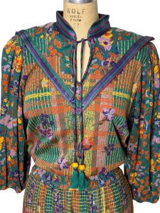 Diane Freis knit dress with floral geo print and pleated skirt Size M/L - Fashionconservatory.com