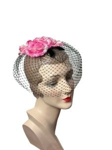 1960s pink flower fascinator hat with veil