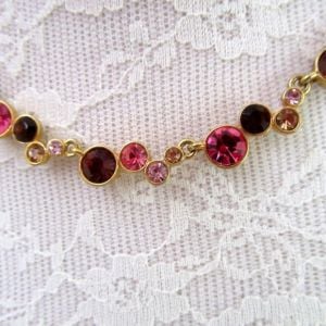 Vintage NAPIER Pink to deep rose rhinestone choker necklace - gold tone setting 1990s - Fashionconservatory.com