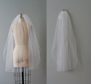 vintage veil with a comb . tulle white veil with silver lace border and crystals