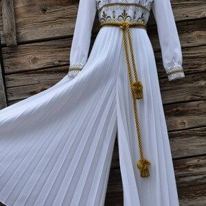 Vintage 1970s Shaheen White and Gold Palazzo Jumpsuit with Gold Tasseled Belt - Fashionconservatory.com