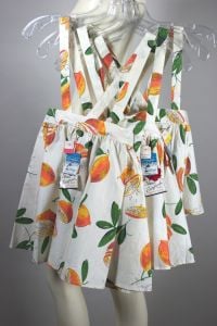 Kid's vintage 1950s pinafore circle skirts deadstock set of 3 orange novelty print