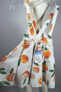 Kid's vintage 1950s pinafore circle skirts deadstock set of 3 orange novelty print - Fashionconservatory.com