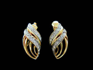 Trifari gold metal & clear rhinestone swirl clip on earrings - Mid Century revival - Fashionconservatory.com